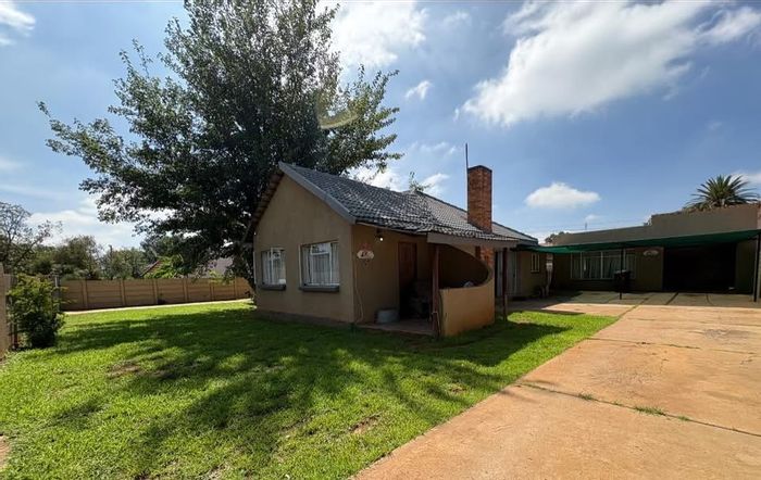 Spacious house with flatlet, garden, and braai area in Stilfontein Ext 4 For Sale.
