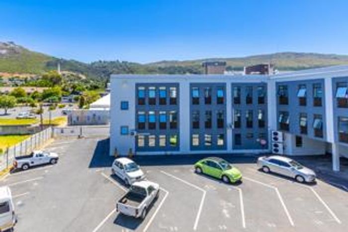 1 Bedroom Apartment For Sale in Paarl Central with secure parking and prepaid utilities.