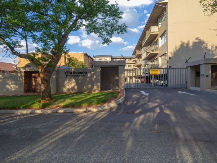 Edenvale Central Apartment For Sale: 2 Bedrooms, spacious kitchen, balcony, prime location.