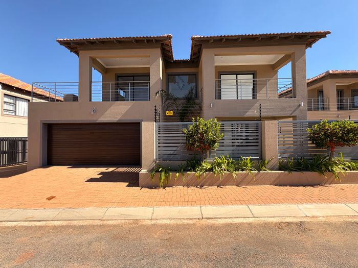 For Sale: Townhouse in Wilkoppies with 3 beds, double garage, and top security.