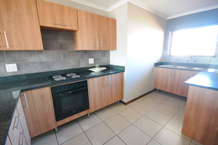 2-Bedroom Apartment To Rent in Eco Park Estate with amenities and easy access.