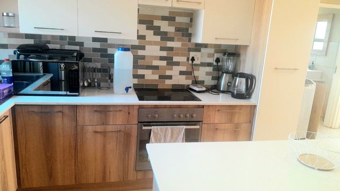 2-Bedroom Apartment For Sale in Die Hoewes with 24-hour security and parking.