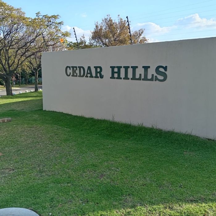 3-Bedroom Townhouse To Rent in Halfway Gardens with pool, garage, and garden access.