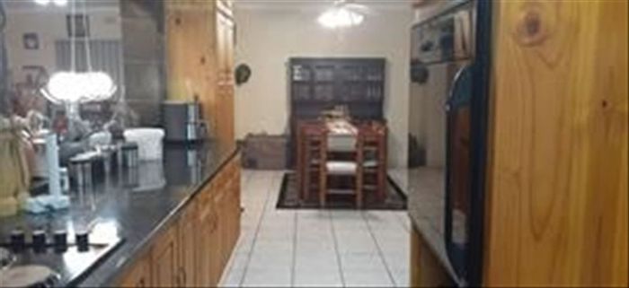 For Sale: Spacious Parkrand house with pool, 4 bedrooms, and ample parking.