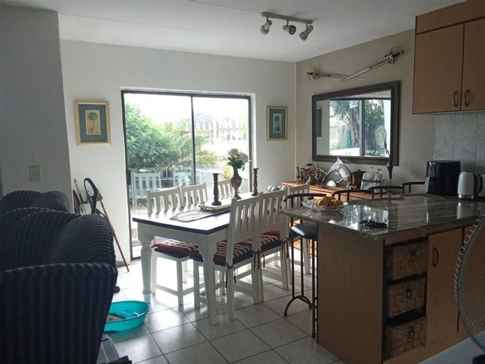 For Sale: Townhouse in Freeway Park with 2 bedrooms, family room, and carport.