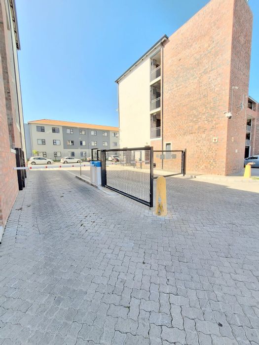 2-Bedroom Apartment For Sale in Belhar, near UWC, secure complex, convenient amenities.