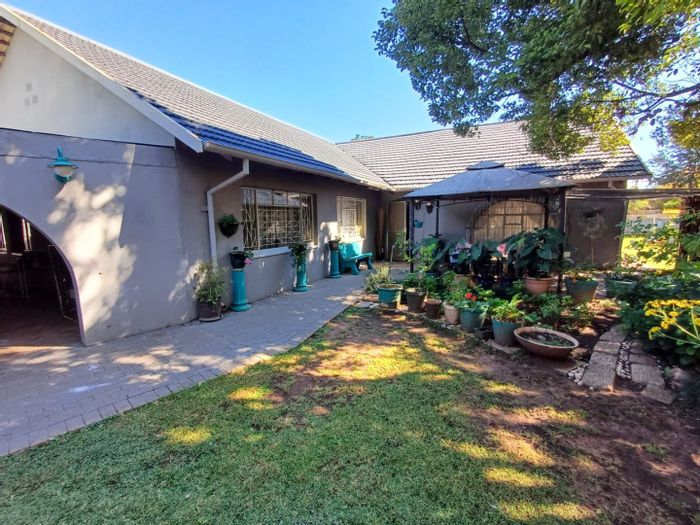For Sale: House in Orkney Central with rental flats, double garage, and borehole.