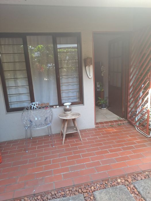 1-Bedroom Apartment To Rent in Bedfordview Central with private garden and amenities.