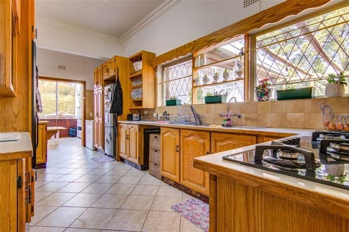 For Sale: Spacious 4-bedroom house in Nimrod Park with pool and staff quarter.