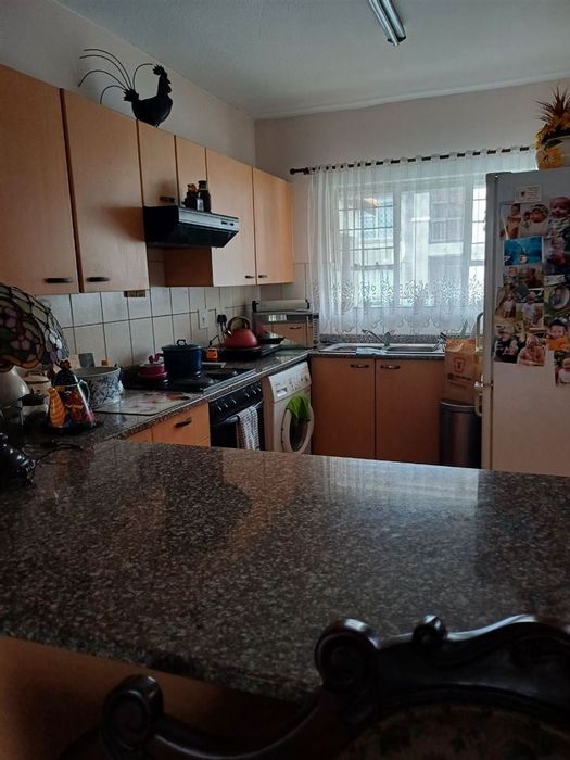 Townhouse For Sale in Van Dyk Park: 3 Bedrooms, pool, study, secure parking.