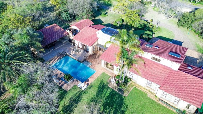 For Sale: House in Randjesfontein AH with stables, pool, tennis court, and gardens.