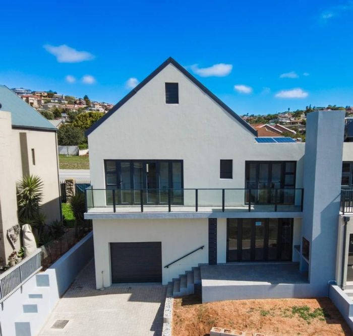 For Sale: House in Hartenbos Central with river views, garage, and secure estate.