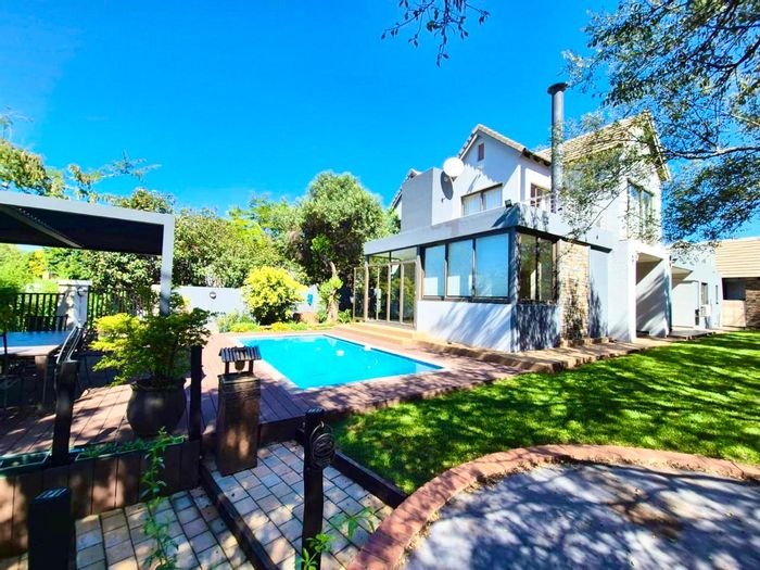 For Sale: Spacious 4-Bedroom House in Midlands Estate with Pool and Greenbelt Views.