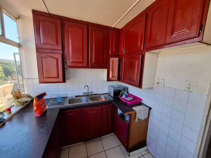 For Sale: 3-Bedroom Apartment in Muckleneuk with Pool, Carport, and Tenants.