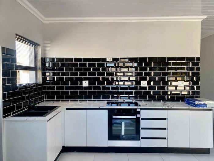 3-Bedroom House To Rent in Schaapkraal with yard, alarm system, and secure parking.