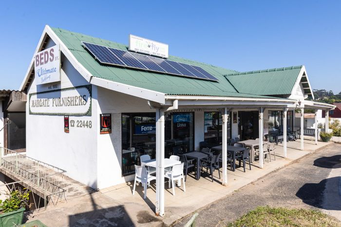 For Sale: Versatile 3-story commercial building in Margate Central with ample parking.