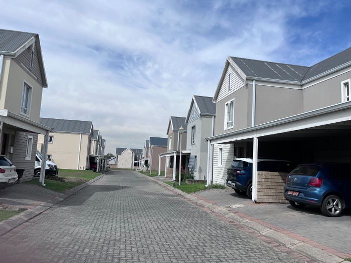 For Sale: Townhouse in Riverspray Lifestyle Estate, 2 beds, private garden, garage.