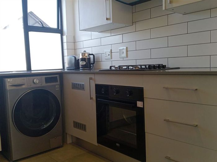 Glen Erasmia Townhouse For Sale: 2 Bedrooms, Family Room, Pool, and open living space.