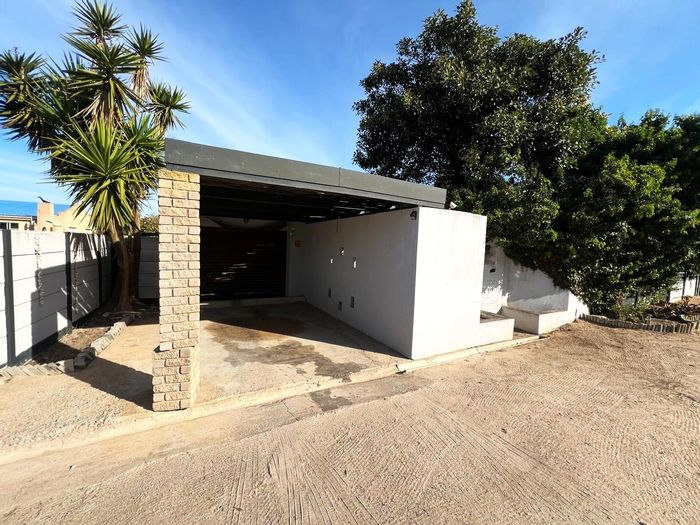 For Sale: 4-Bedroom House in Britannia Bay with beach access and rental potential.