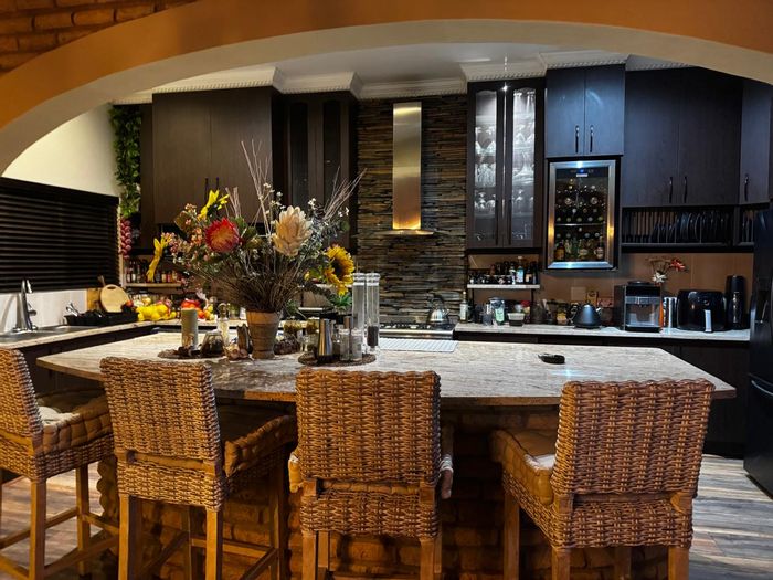 House for Sale in Marina Martinique: Open-plan living, braai area, canal views.