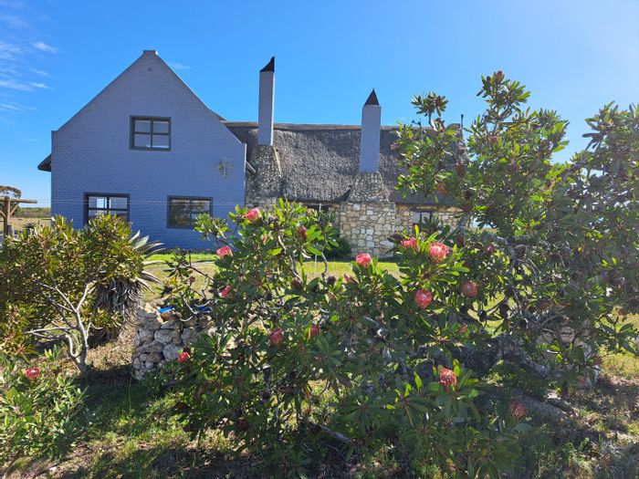 For Sale: 650 Ha Farm in Stilbaai Rural with multiple dwellings and eco-tourism potential.