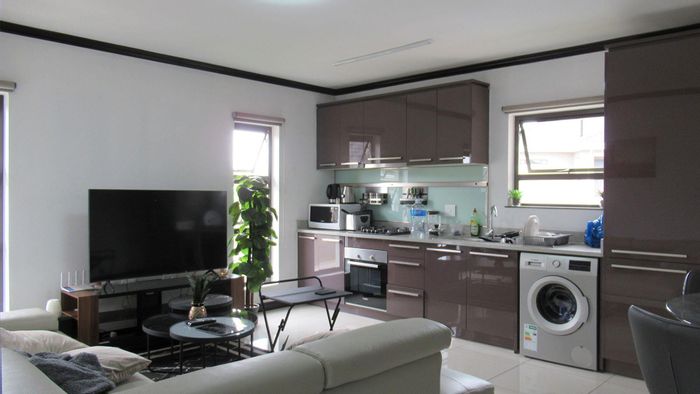 For Sale: Apartment in Kengies with secure access, balcony, and communal gardens.