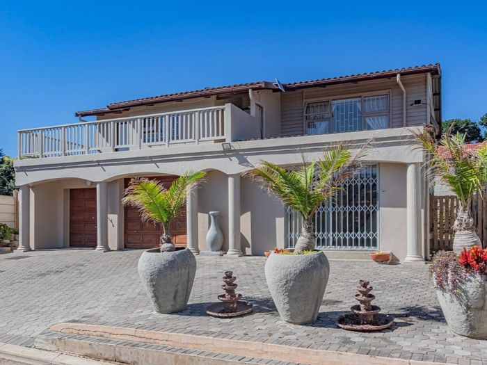 Tergniet House For Sale: 3 bedrooms, beach proximity, dual garages, and outdoor braai spaces.