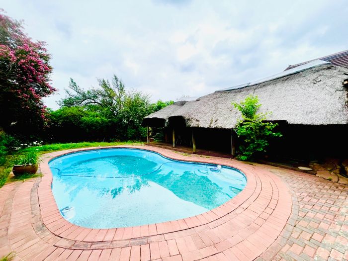 For Sale: House in Sasolburg Ext 11 with 4 bedrooms, pool, and spacious yard.