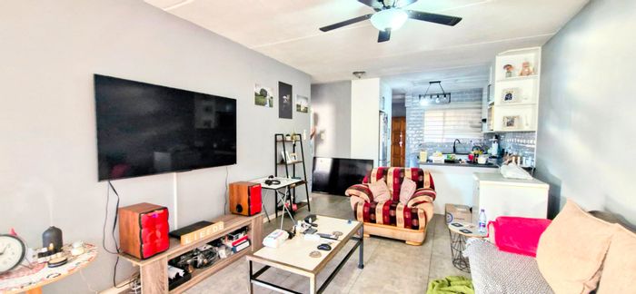 For Sale: Buccleuch Townhouse with 2 beds, pool, gardens, and 24-hour security.