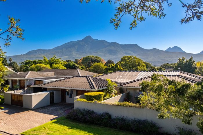 Bergsig House For Sale: Spacious home with garden flat, pool, and gym.