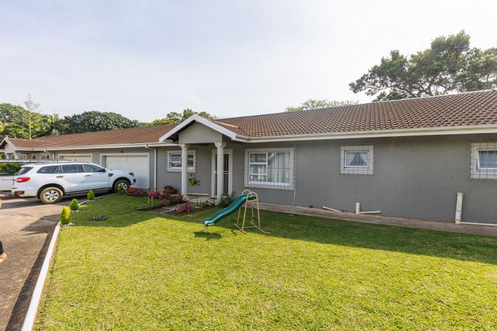 For Sale: 3-Bedroom Townhouse in Uvongo with private yard and double garage.