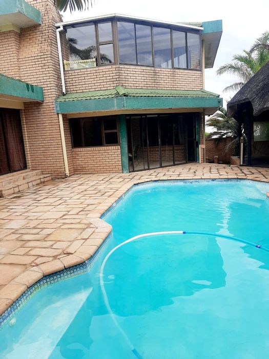 For Sale: House in Beacon Bay with sea views, pool, and entertainment areas.