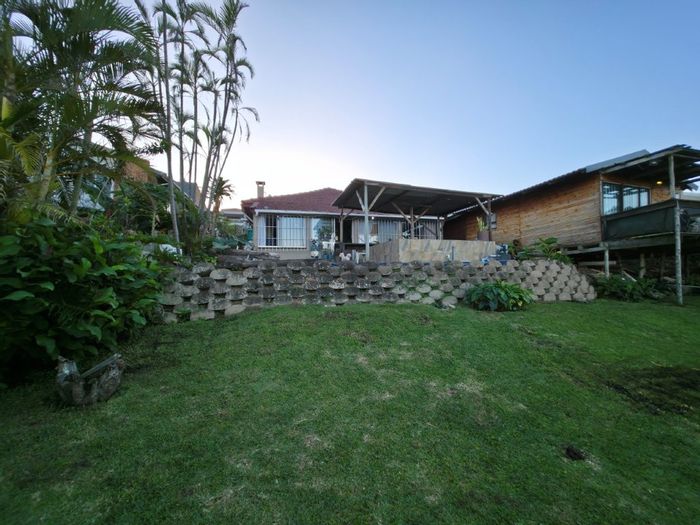 House for Sale in Uvongo: Sea views, extra accommodation, close to amenities.