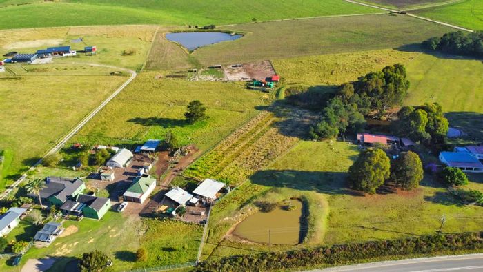 Wilderness Rural Farm For Sale: Self-sufficient living with multiple dwellings and extensive water systems.