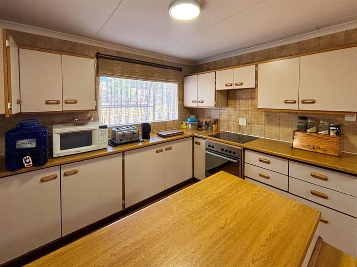 For Sale: House in Birchleigh North with 4 bedrooms, multiple living areas, and parking.