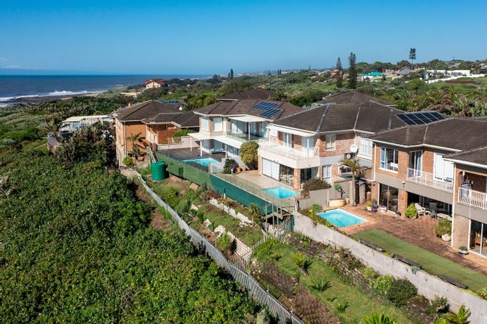 Beachside house in Shelly Beach for sale with pool, sea views, and secure complex.