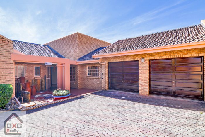 For Sale: Spacious Zwartkop Townhouse with Garden, Secure Complex, Wheelchair-Friendly.