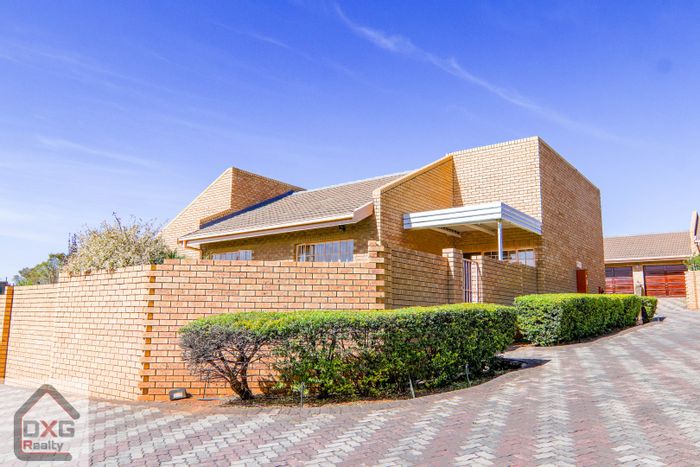 For Sale: Spacious Zwartkop Townhouse with Garden, Secure Complex, Wheelchair-Friendly.
