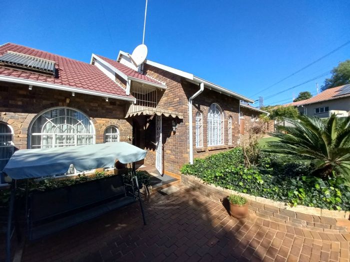 For Sale: House in Dawnview with rental cottages, pool, and 24-hour security.