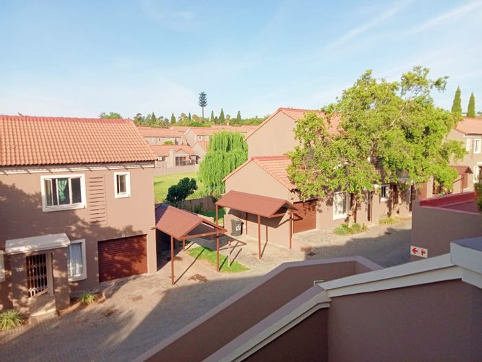Townhouse For Sale in Halfway House: 3 beds, garage, near amenities.