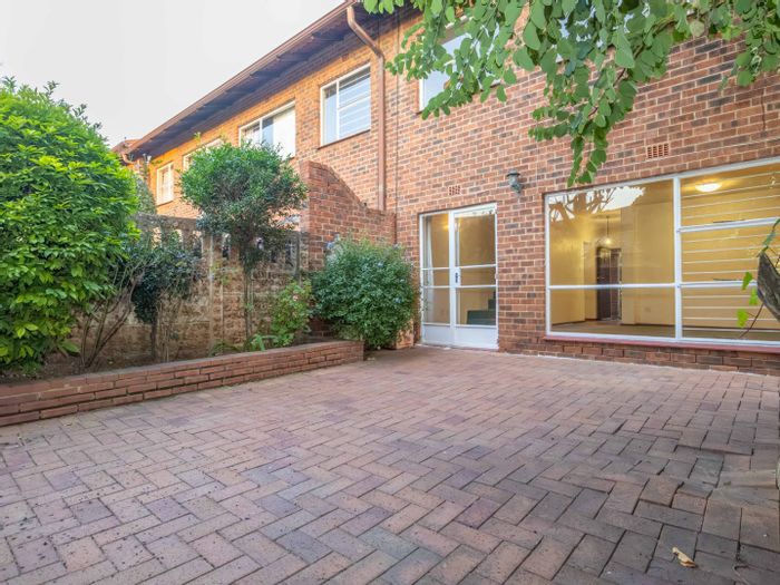 For Sale: Bedford Gardens Townhouse with garden, 24-hour security, and parking.