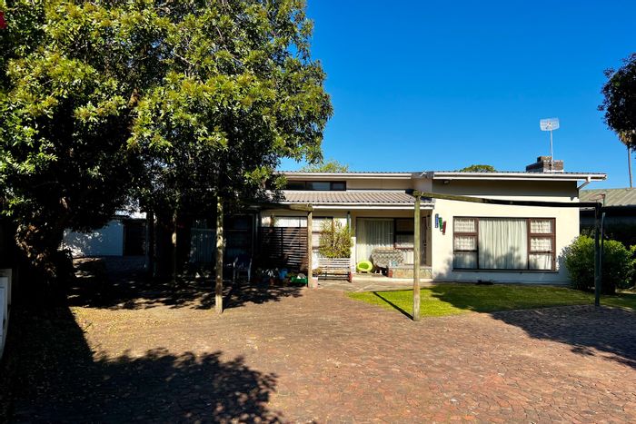 George Central House For Sale: Multi-unit investment with rental income potential.