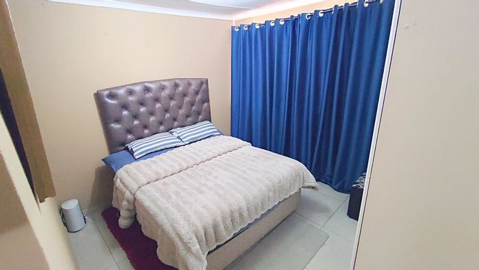 2-Bedroom Townhouse in Heuwelsig Estate For Sale with garden and 24-hour security.