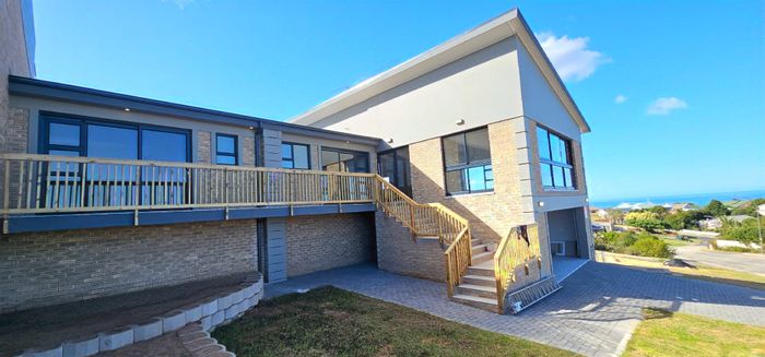 For Sale: House in Dana Bay with ocean views, double garage, and spacious living.