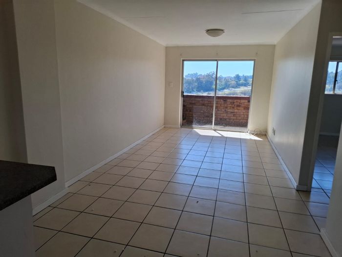 For Sale: 2-Bed Apartment in Zwartkop with Lake Views and Secure Garage.