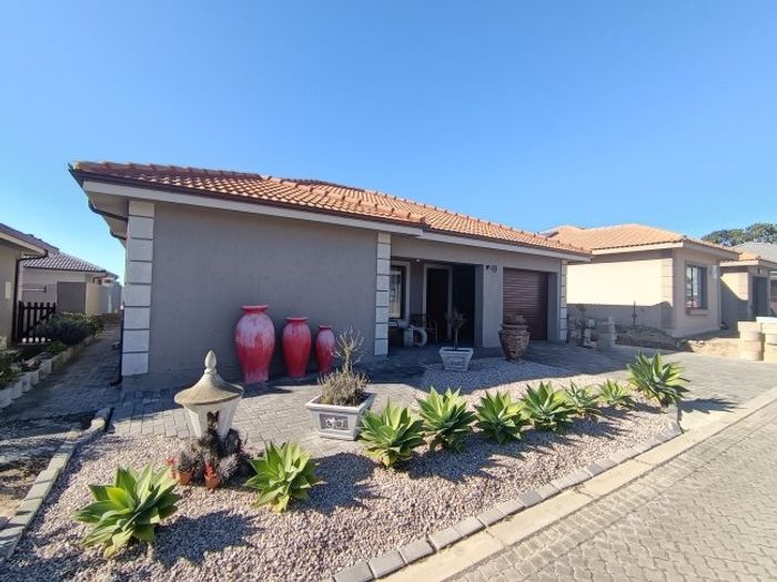 For Sale: Townhouse in Dana Bay with 2 en-suite bedrooms, garage, and garden.
