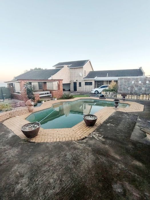 For Sale: Spacious Sunnyridge house with pool, gym, study, and large garage.