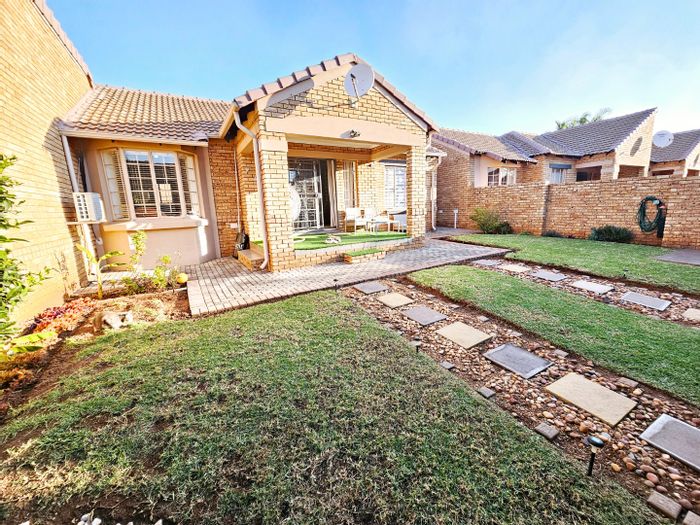 For Sale: Townhouse in Monavoni with private garden, double garage, and security.