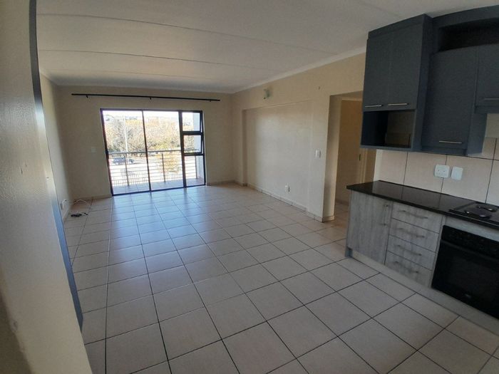 Two-bedroom apartment in Barbeque Downs with pool, security, and parking available to rent.