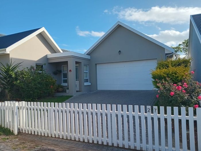For Sale: House in Kraaibosch Country Estate with garden, greenhouse, and secure living.